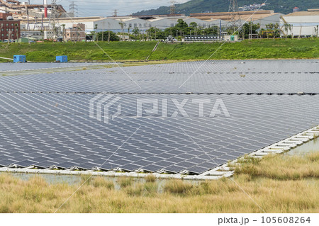 View of the floating Solar power system on the flood detention basin in Kaohsiung, Taiwan. View of the floating Solar power system on the flood detention basin in Kaohsiung, Taiwan. 105608264