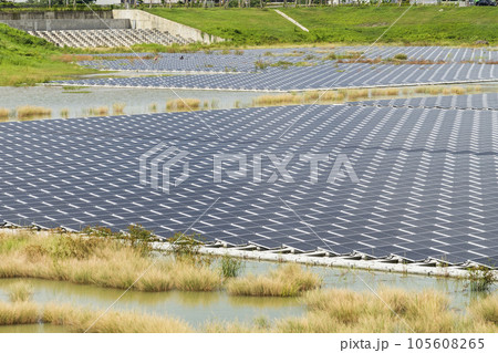 View of the floating Solar power system on the flood detention basin in Kaohsiung, Taiwan. View of the floating Solar power system on the flood detention basin in Kaohsiung, Taiwan. 105608265