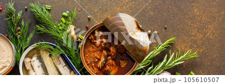 Open tin cans with canned fish Open tin cans with canned fish 105610507