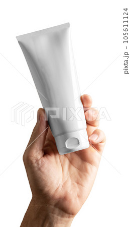 Men hand holding cosmetic product mockup, cream tube isolated on white background 105611124