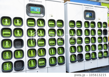 Taiwanese Gogoro electric vehicle company's swappable batteries and charging infrastructure. Batteries charging station for scooter bike motorcycles. Taiwanese Gogoro electric vehicle company's swappable batteries and charging infrastructure. Batteries charging station for scooter bike motorcycles. 105613215