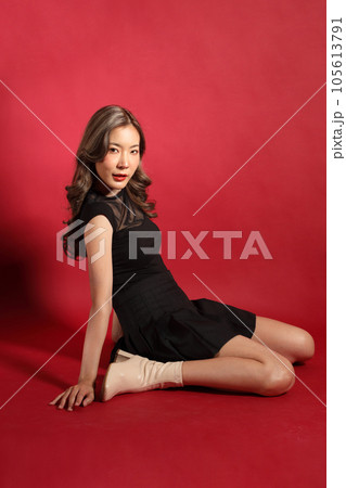Woman in Red 105613791