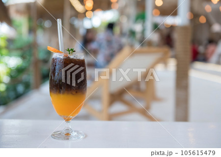 iced americano black coffee with orange yuzu at modern coffee cafe 105615479
