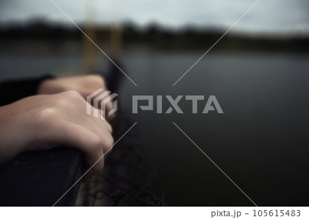 bullying teen girl aloofness young detachment a lonely helpless woman thinks about life and does not want to live looks at a gloomy photo into the distance and a renunciate thinks alone with herself 105615483