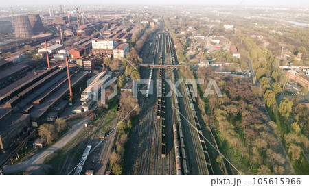 Aerial Top view to railway cylindrical tank shipping containers Rail. Striped creative transport industry representation. railroads and freight trains to transport cargo 105615966