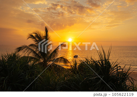 aerial view sunset at Karon beach.Karon beach is a beach is broad and long. Sand and beautiful beach suitable for swimming and used as a training dive..Karon beach have many kind of water sports 105622119