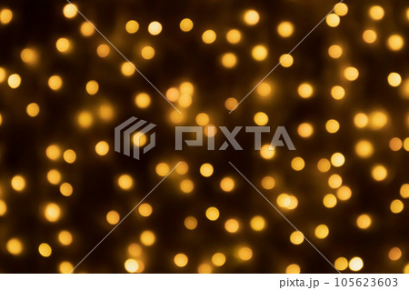 Abstract blur golden bokeh light Christmas holiday background 105623603