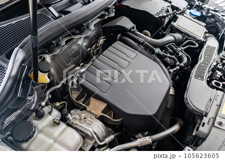 modern car engine under hood close up detail modern car engine under hood close up detail 105623605