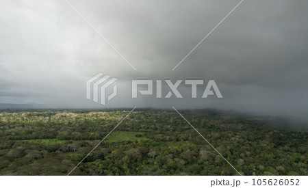 Rain storm over tropical landscape Rain storm over tropical landscape 105626052