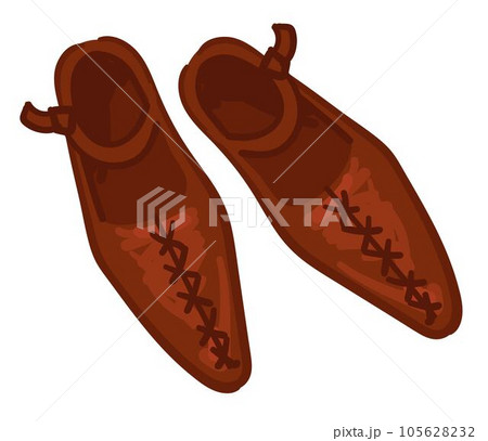 Ancient boots with straps, leather old shoes decor Ancient boots with straps, leather old shoes decor 105628232