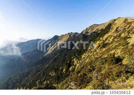 Layers of magnificent mountains landscape in Hehuanshan of Nantou, Taiwan. Taroko National Park is one of Taiwan's most popular tourist attractions. Layers of magnificent mountains landscape in Hehuanshan of Nantou, Taiwan. Taroko National Park is one of Taiwan's most popular tourist attractions. 105630612