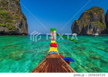 Traditional longtail boat in Maya bay on Koh Phi Phi Leh Island, Krabi, Thailand Traditional longtail boat in Maya bay on Koh Phi Phi Leh Island, Krabi, Thailand 105630720