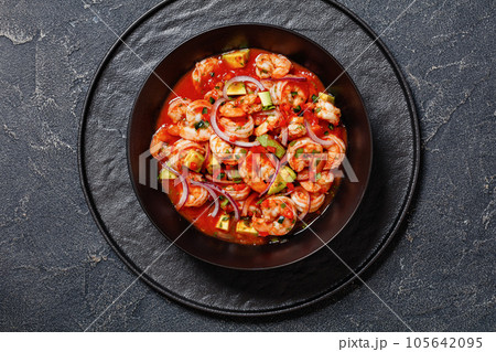 mexican shrimp cocktail salad in a bowl, top view mexican shrimp cocktail salad in a bowl, top view 105642095