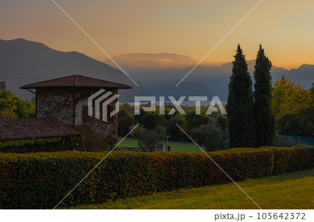 A landscape of the countryside near Iseo Lake at sunrise, Italy A landscape of the countryside near Iseo Lake at sunrise, Italy 105642372