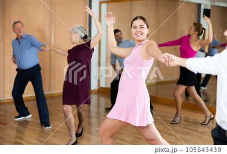 young woman with partner dance paso doble 105643439