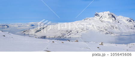 Greenlandic ice cap winter Sermitsiaq mountain and sea fjord panorama, Nuuk, Greenland 105645606