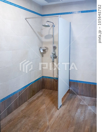 Shower with watering can and partition in the pool, modern interior Shower with watering can and partition in the pool, modern interior 105648782
