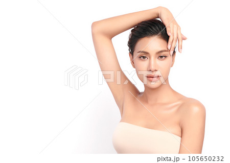 Beautiful young asian woman with clean fresh skin on white background, Face care, Facial treatment, Cosmetology, beauty and spa, Asian women portrait. Beautiful young asian woman with clean fresh skin on white background, Face care, Facial treatment, Cosmetology, beauty and spa, Asian women portrait. 105650232