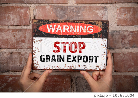 Stop Grain Export Concept. Warning sign on brick background Stop Grain Export Concept. Warning sign on brick background 105651604