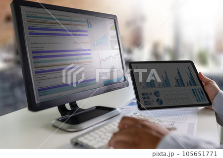Businessmen work hard. Using analytics, Data analytics, statistics, information, Business Technology Intelligence (BI), and business strategy for finance statistic analysis 105651771