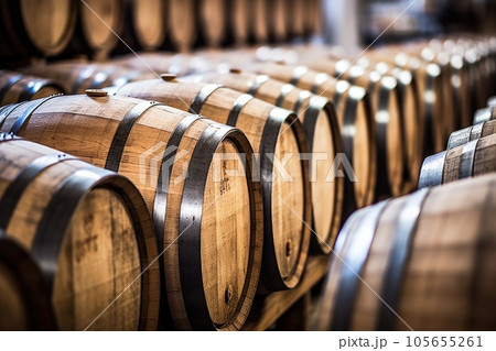 Wooden oak Port barrels in neat rows 105655261