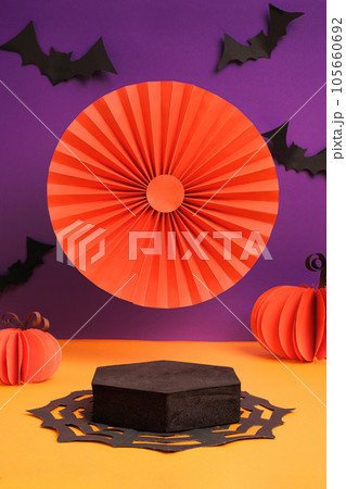 Product Display halloween decor party holiday studio set up in orange and violet color background with bat ,pumpkin,spider web Product Display halloween decor party holiday studio set up in orange and violet color background with bat ,pumpkin,spider web 105660692