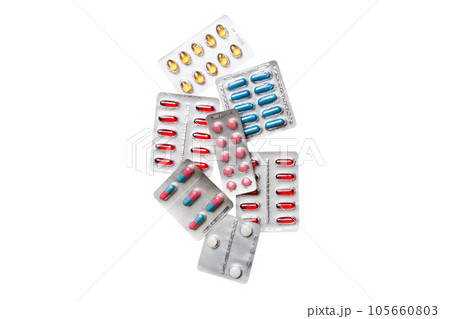 Protective face masks or surgical masks, medicine pills and thermometer on table background. Coronavirus disease. Corona virus concept. Space for text Protective face masks or surgical masks, medicine pills and thermometer on table background. Coronavirus disease. Corona virus concept. Space for text 105660803