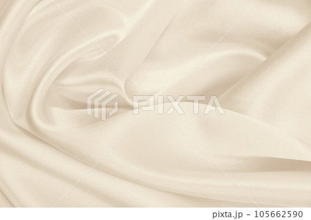 Smooth elegant golden silk or satin luxury cloth texture as wedding background. Luxurious background design. In Sepia toned. Retro style Smooth elegant golden silk or satin luxury cloth texture as wedding background. Luxurious background design. In Sepia toned. Retro style 105662590
