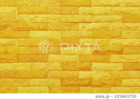 Golden yellow brick wall texture with vintage style pattern for background and design art work. Golden yellow brick wall texture with vintage style pattern for background and design art work. 105663730