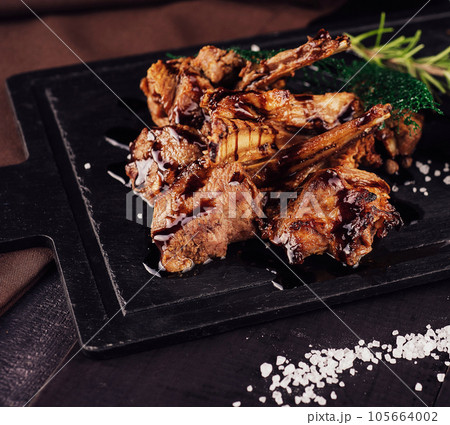 BBQ Grilled lamb chops steaks on board BBQ Grilled lamb chops steaks on board 105664002