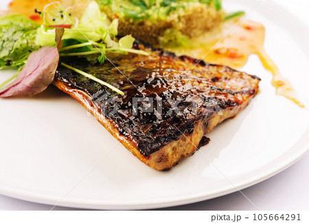 Fish dish - fried fish fillet and vegetables Fish dish - fried fish fillet and vegetables 105664291