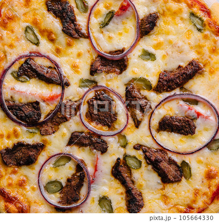 italian pizza with tomatoes, cheese, onions closeup italian pizza with tomatoes, cheese, onions closeup 105664330