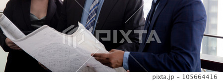 Senior architect and secretary inspector check blueprint and structure with contractor together. 105664416