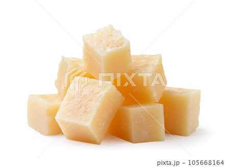 Pieces of parmesan cheese on a white background. Isolated Pieces of parmesan cheese on a white background. Isolated 105668164