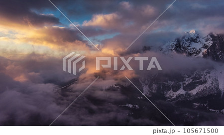 Rocky mountains at sunset aerial 105671500