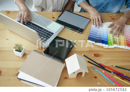 Graphic designer working on digital tablet. artist drawing on graphic tablet and Color swatch samples. Artist Creative Designer sketch graphic drawing creative creativity draw studying work on tablet Graphic designer working on digital tablet. artist drawing on graphic tablet and Color swatch samples. Artist Creative Designer sketch graphic drawing creative creativity draw studying work on tablet 105672582