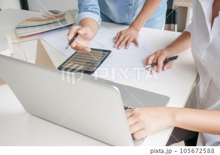 Architecture drawing on architectural project business architecture building construction Colleagues interior designer Corporate. Planning Design on blueprint Teamwork with compasses. 105672588