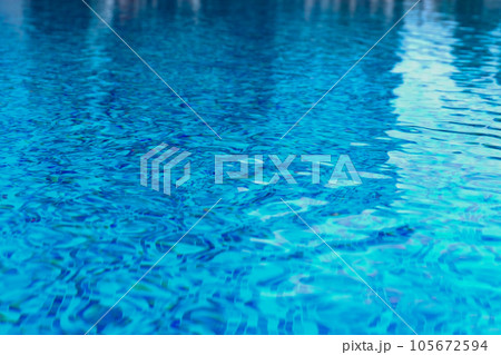 Abstract pool water.  Swimming pool flow with waves background surface of blue swimming pool 105672594