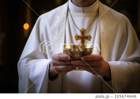 Catholic priest administers Holy Communion Catholic priest administers Holy Communion 105674646