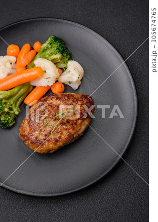 Delicious fresh fried minced fish cutlets with spices and herbs 105674765