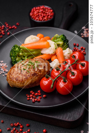 Delicious fresh fried minced fish cutlets with spices and herbs Delicious fresh fried minced fish cutlets with spices and herbs 105674777
