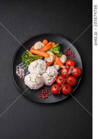 Delicious healthy steamed chicken cutlets or minced meatballs Delicious healthy steamed chicken cutlets or minced meatballs 105674786