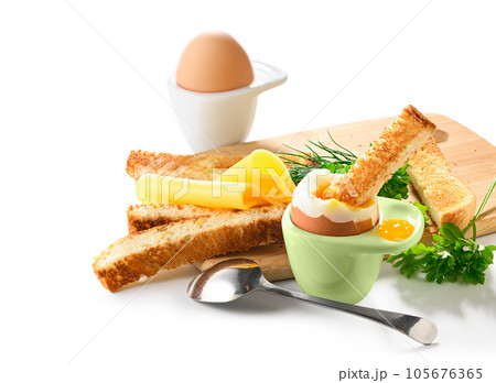 Soft boiled eggs with toast and cheese on breakfast Soft boiled eggs with toast and cheese on breakfast 105676365