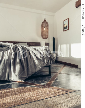 Loft style bedroom with gray bed linen set 105676791