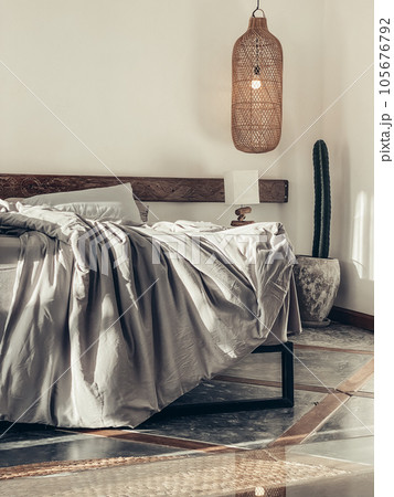 Loft style bedroom with gray bed linen set 105676792