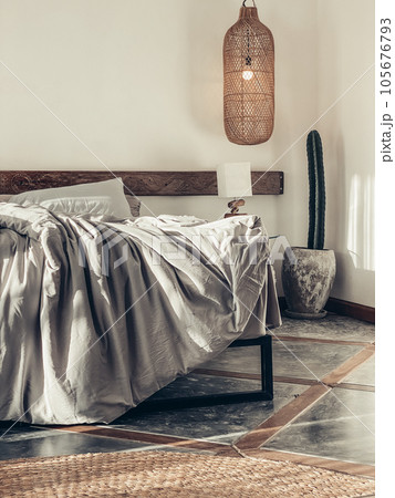 Loft style bedroom with gray bed linen set Loft style bedroom with gray bed linen set 105676793