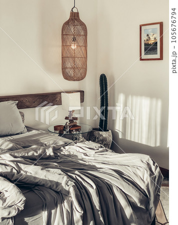 Loft style bedroom with gray bed linen set 105676794