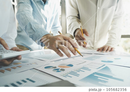 Team work process. Young business managers crew working with new startup project. 105682356