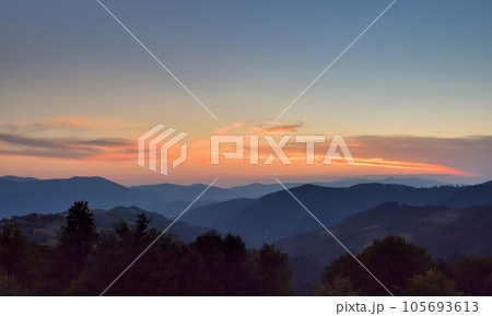 Amazing sunset and mountains in the background. Mountain landscape. Amazing sunset and mountains in the background. Mountain landscape. 105693613