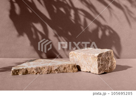 Podium with dry grass for product promotion and cosmetics display. Natural beige beauty pedestal. Background for product presentation. Podium with dry grass for product promotion and cosmetics display. Natural beige beauty pedestal. Background for product presentation. 105695205